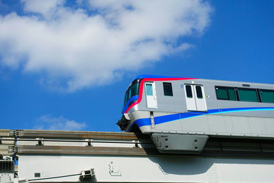 Low angle view of train against sky