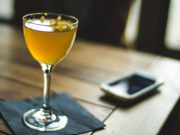 Close-up of wine glass on table