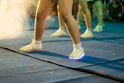 Low section of women dancing on stage