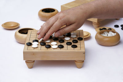 High angle view of person playing piano