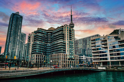 View of buildings against cloudy sky