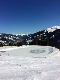 Winter snow covered mountain peaks in austrian alps. 