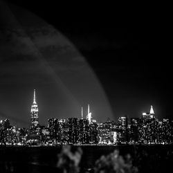 Illuminated cityscape at night