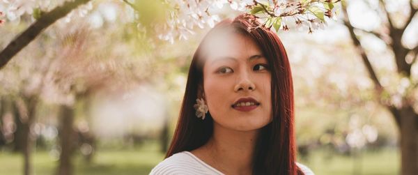 Portrait of beautiful young woman outdoors