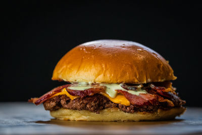 Close-up of burger on table