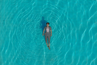 High angle view of swimming in sea