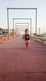 Full length of woman standing in park