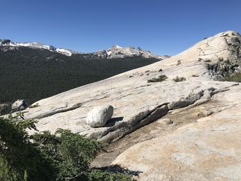 Scenic view of rocky mountains against clear sky