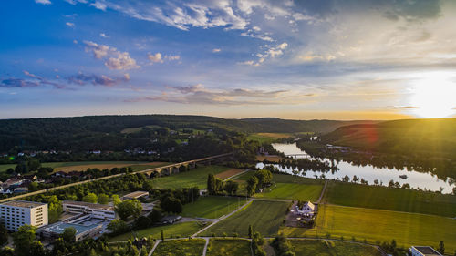 High angle view of city against sky during sunset