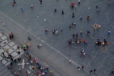 High angle view of people walking on street