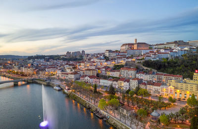 Coimbra city drone view with historic buildings at sunset, in portugal