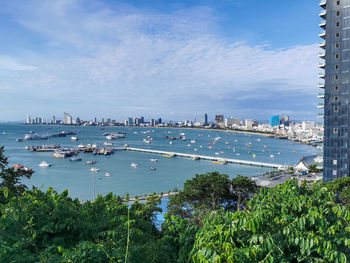 View of bay of pattaya with buildings in background