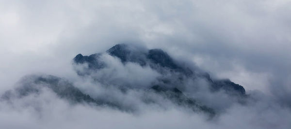 Scenic view of majestic mountains against sky