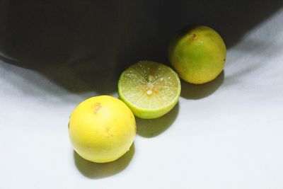 Citrus fruits with fresh yellow color arranged in parallel in stillife photography mode