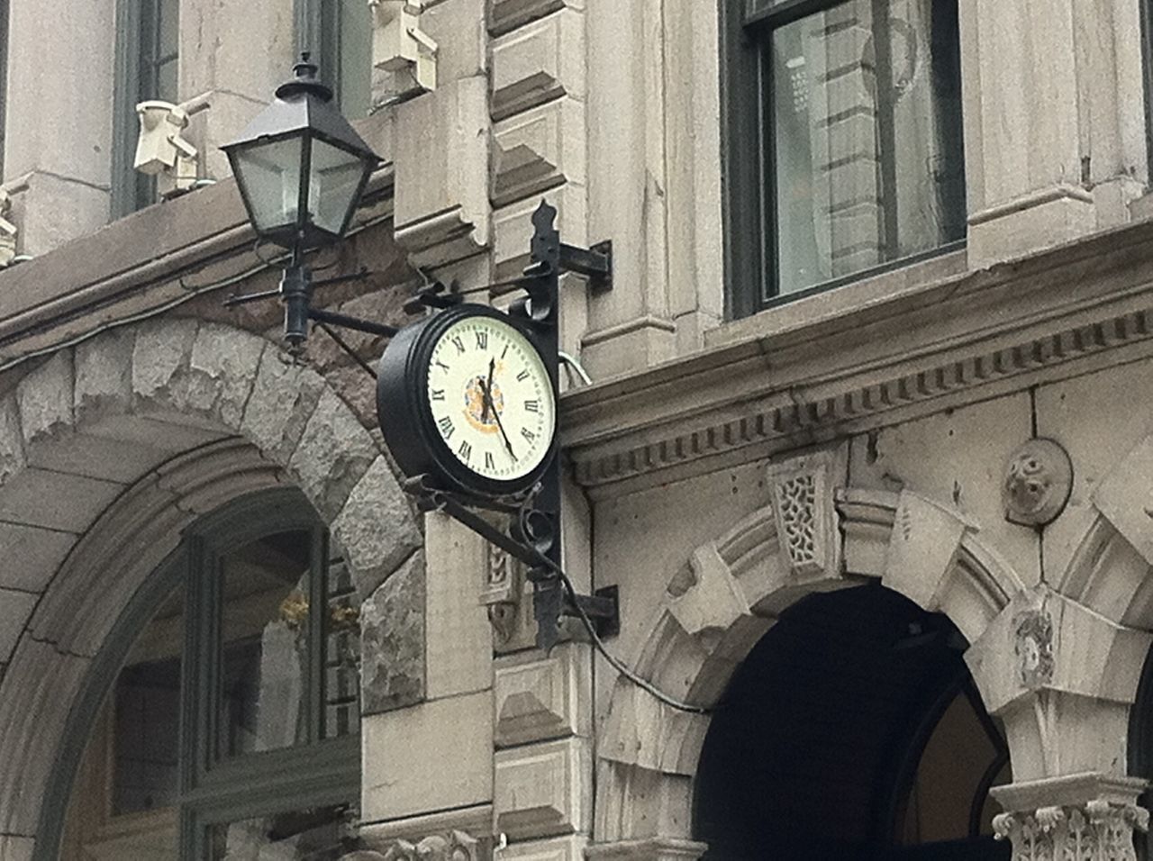 architecture, built structure, building exterior, low angle view, clock, time, church, window, arch, circle, religion, clock face, building, old-fashioned, clock tower, day, no people, history, old