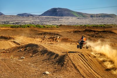 Person riding quad bike