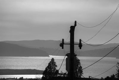 Electricity pylon against sky