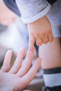 Close-up of couple hands