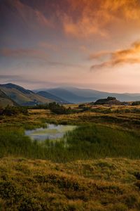 Scenic view of landscape against sky during sunset