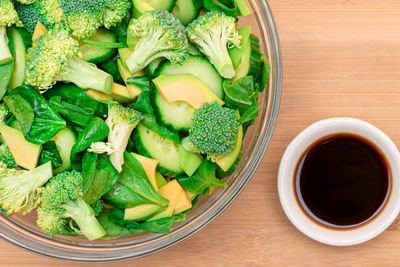 High angle view of chopped vegetables in bowl on table