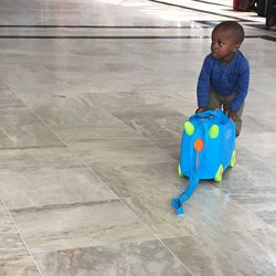 High angle view of boy looking at camera