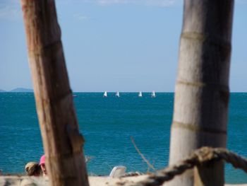 Scenic view of sea against blue sky