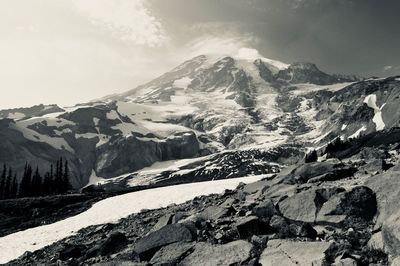 Scenic view of snowcapped mountains against sky