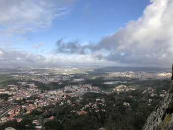 Aerial view of townscape against sky