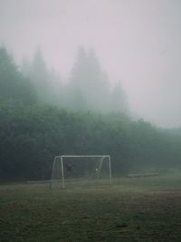 View of soccer field in foggy weather