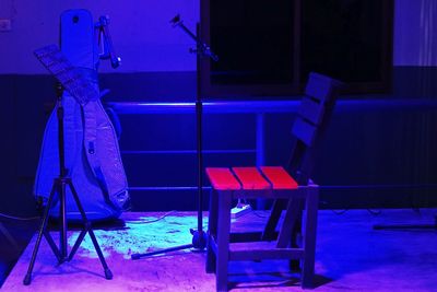 Empty chair with microphone stand