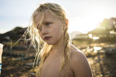 Portrait of teenage girl looking away