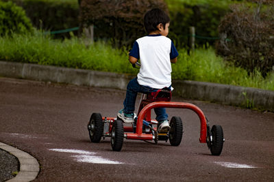 Boy riding bicycle