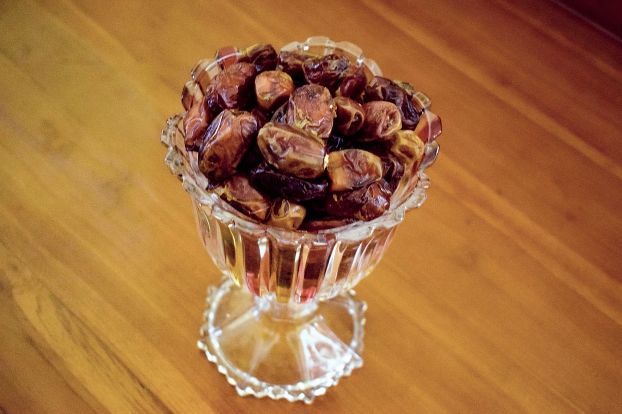 food and drink, table, food, indoors, still life, wood - material, freshness, close-up, high angle view, sweet food, no people, fruit, dessert, focus on foreground, sweet, healthy eating, indulgence, glass, ready-to-eat, wellbeing, temptation, snack