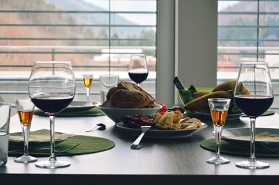 Glass of wine glasses on table