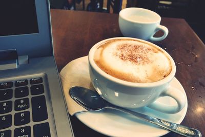 Coffee cup on table