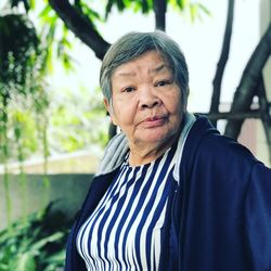 Portrait of man standing outdoors