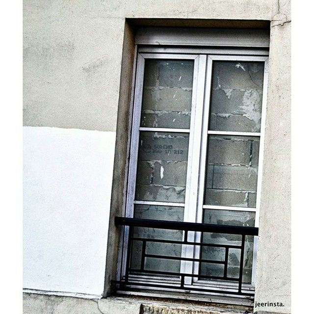 window, architecture, building exterior, built structure, glass - material, closed, door, house, building, residential structure, residential building, day, transparent, reflection, old, low angle view, outdoors, no people, facade, entrance