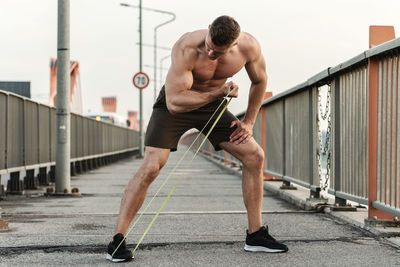 Full length of man exercising outdoors