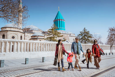 Group of people walking on street