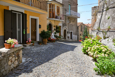 Old houses on a narrow street in maenza, a medieval village near rome in italy.