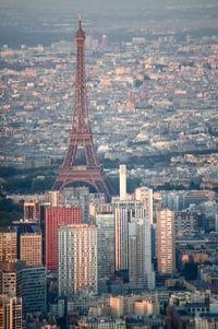 Aerial view of the eiffel tower behind the beaugrenelle buildings in paris taken from helicopter 
