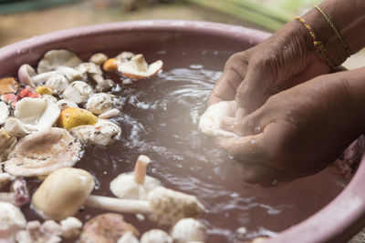 Close-up of person preparing food