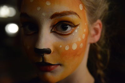 Close-up portrait of girl with pained face