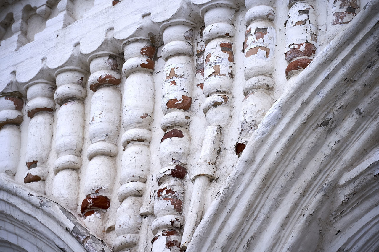 LOW ANGLE VIEW OF CROSS ON SNOW COVERED