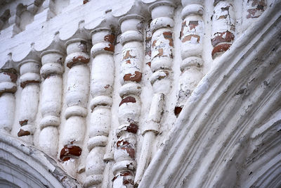 Low angle view of cross on snow
