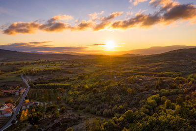 Drone aerial panorama of sortelha near termas radium hotel serra da pena at sunset in portugal