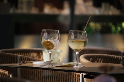 Close-up of wineglasses on table