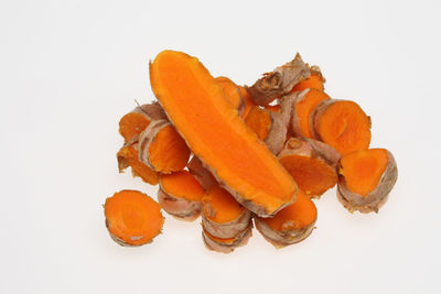 Close-up overhead view of food on white background