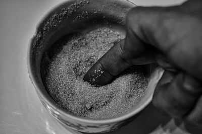 Close-up of cropped hand holding ice cream