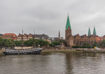 View of river with buildings in background